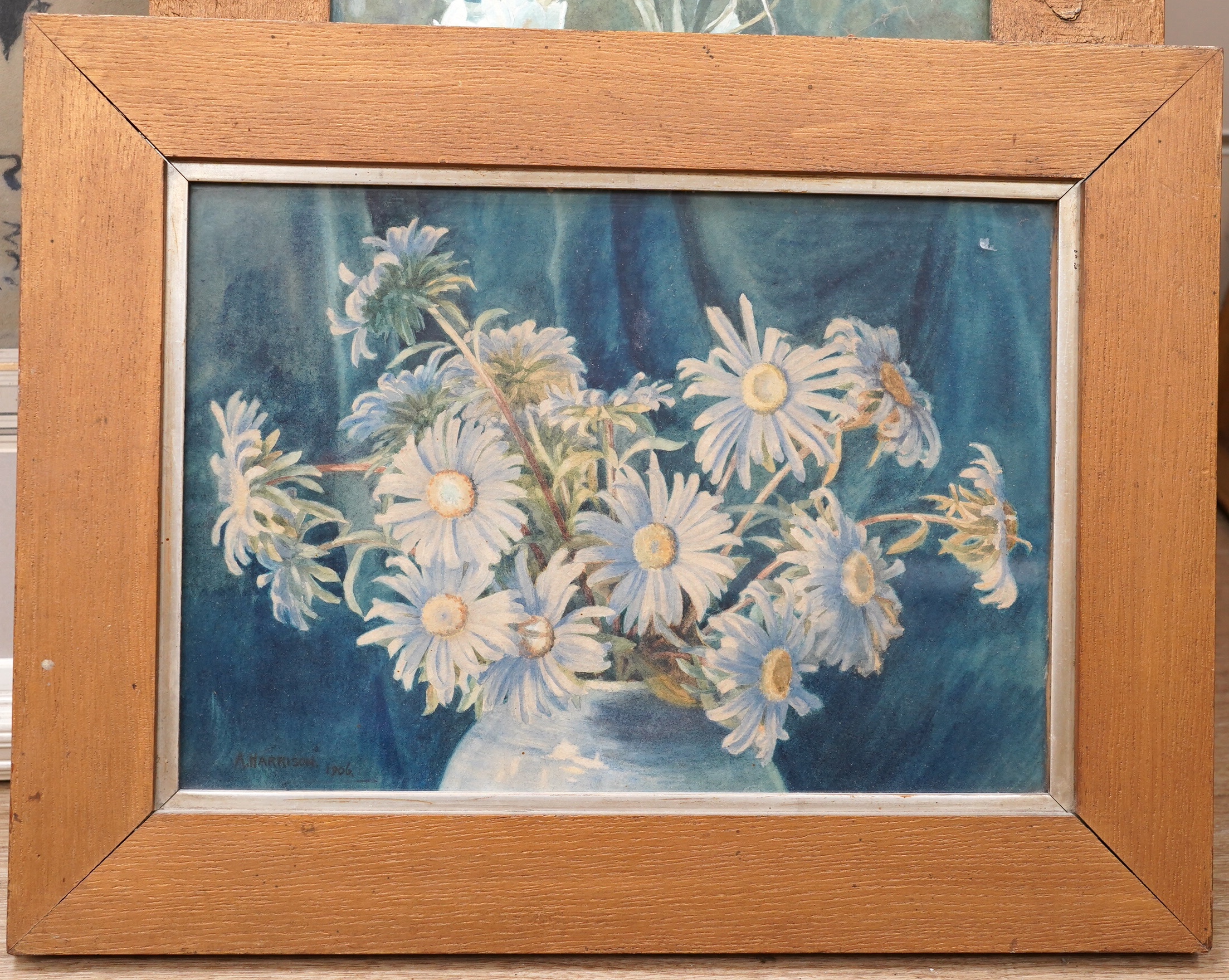 A. Harrison, two watercolours, Still lifes of flowers, each signed and dated 1906 and 1908, together with another similar early 20th century study of flowers, 50 x 21cm. Condition - fair